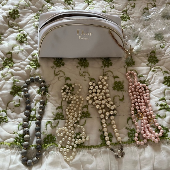Dior cosmetic bag & some fun beaded jewelry. Great size for travel.